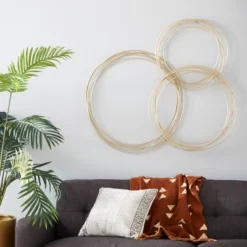 Metal Plate Overlapping Ring Wall Decor - CosmoLiving By Cosmopolitan 10 Metal Plate Overlapping Ring Wall Decor - CosmoLiving By Cosmopolitan -Home Decor Series Store GUEST 63c7ac7b 4fb0 4916 a08b 782b1171fd91